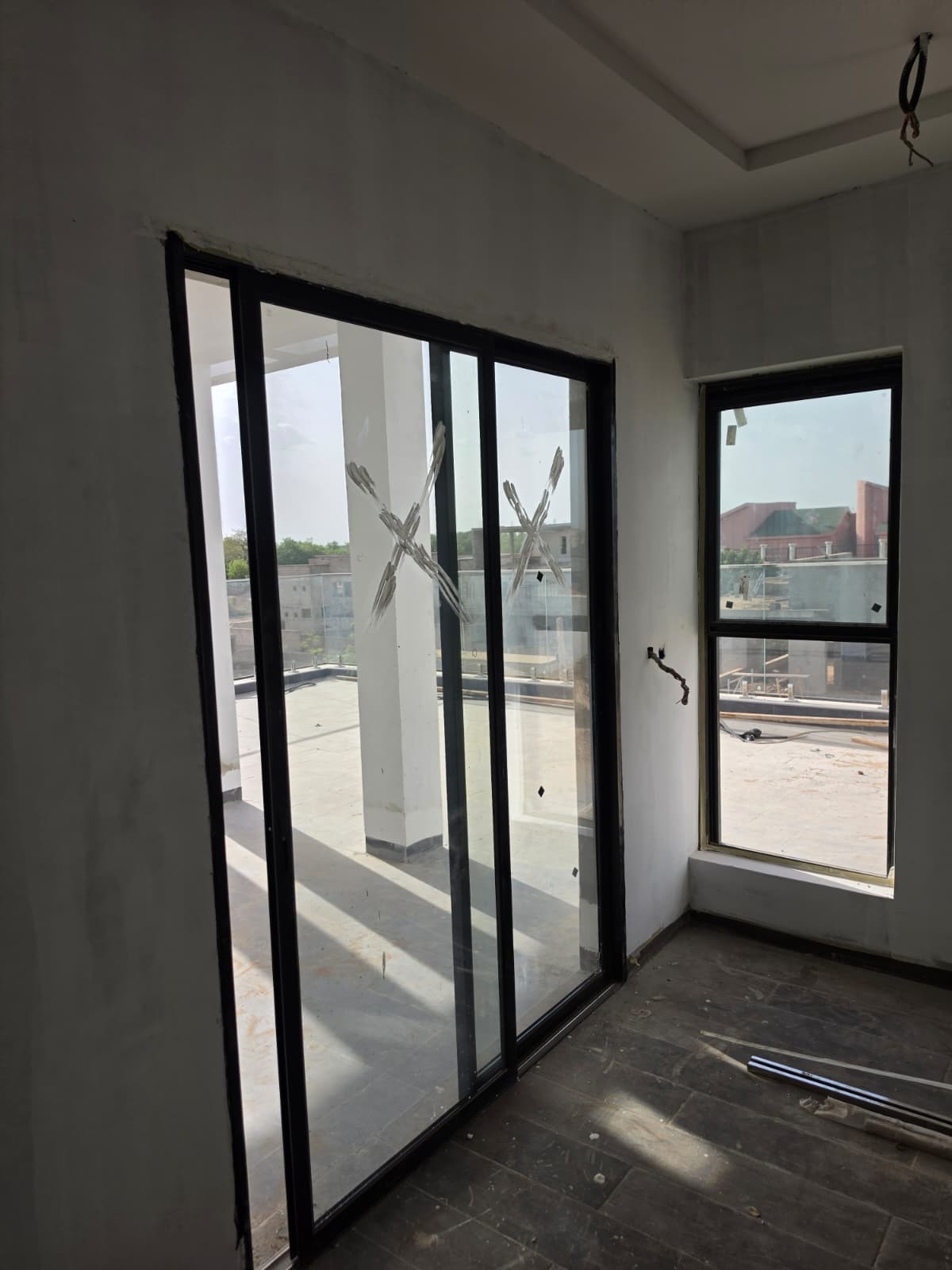 Aluminum glass door with frosted glass for residential project in Ouagadougou.jpg